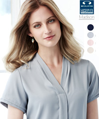 The Madison Blouse #S628LS Shorts Sleeve is a versatile workplace uniform blouse available in Midnight Blue, Silver Mist, Blush Pink, Ivory. Has a concealed button placket, a built in action back pleat and functional easy care fabric.  Fuss free fabric with a litte STRETCH so you will be comfortable all day long. Sizes 6-26. For all the details on Staff Uniforms please call Renee Kinnear or Shelley Morris on FreeCall 1800 654 990