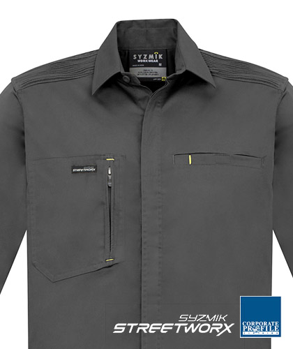 Streetworx Sophisticated Work Shirt #ZW350 (CHAR) With Logo Service. A great option for Indoor-Outdoor Techies, Agri Business, Manufacturing, Automotive, who are looking for a edgy style of work day outfit. Teams up with modern work pant and shorts. Movement, Cooler, Productive, UPF Protective. Modern slim fit with stretch. Great looking shirts available Navy, Khaki, Charcoal, Black. Lightweight Cotton Stretch fabric, 150gsm in Sizes XXS-5XL and 7XL. Stretch cotton provides increased freedom of movement and comfort. Roll up tab sleeves. Unique stretch pleating across the shoulder to provide movement and reinforcement. The Right chest pocket has a Zip closure. Left chest pocket is deep and has a pen partition. Free Call 1800 654 990